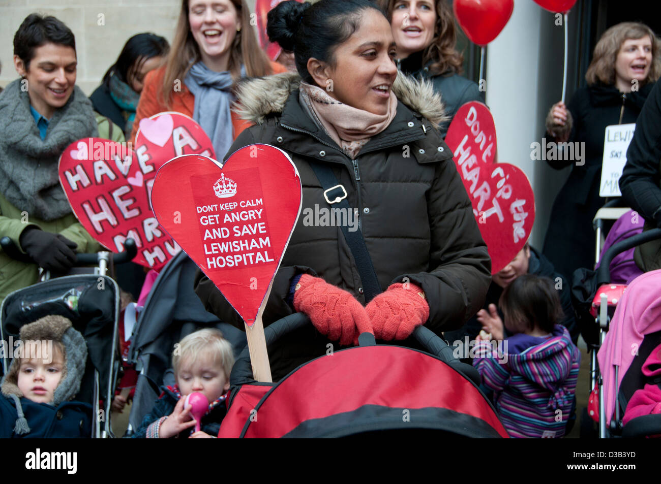 Protest outside the Department of Health by mothers and babies against the proposed downgrading of Lewisham hospital Stock Photo