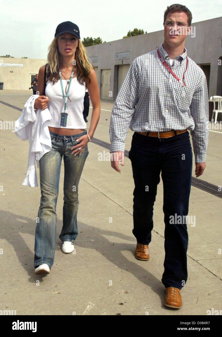 (dpa) - German formula 1 pilot Ralf Schumacher and his wife Cora arrive