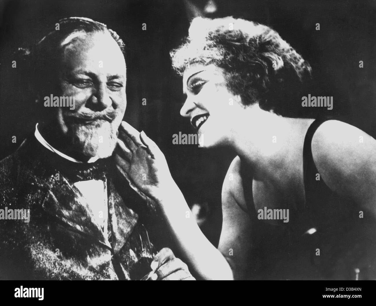 (dpa files) - Lola-Lola (Marlene Dietrich) bewitches Professor Unrat (Emil Jannings) in the Ufa production 'The Blue Angel' ('Der Blaue Engel'), Germany, 1929. The film was Dietrich's breakthrough to world stardom. Stock Photo