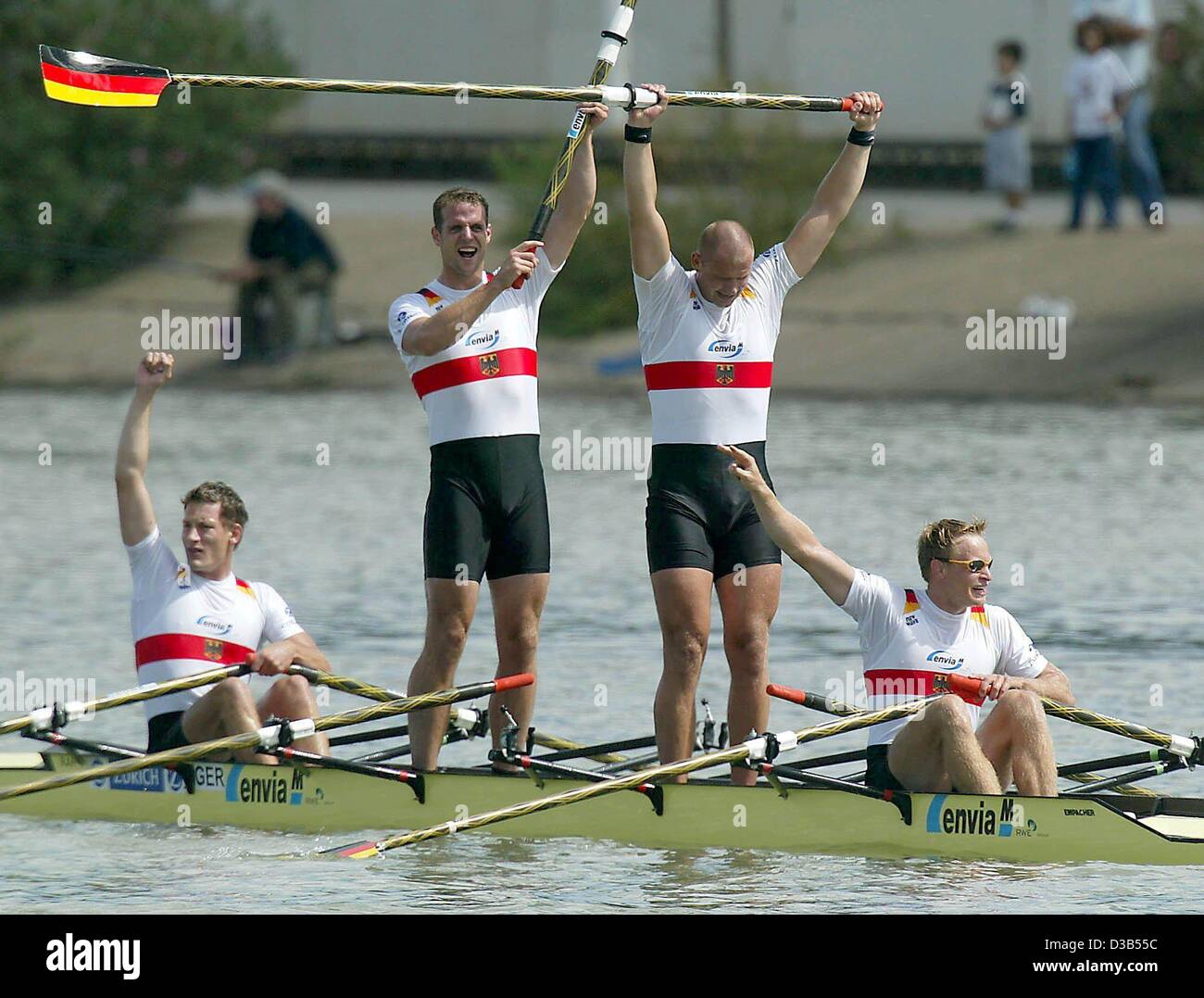 (dpa) - The German quadruple scull team cheers after winning gold in the Rowing World Championships in Seville, Spain, 22 September 2002. L-R: Rene Bertram, Stephan Volkert, Marco Geisler and Robert Sens. Stock Photo