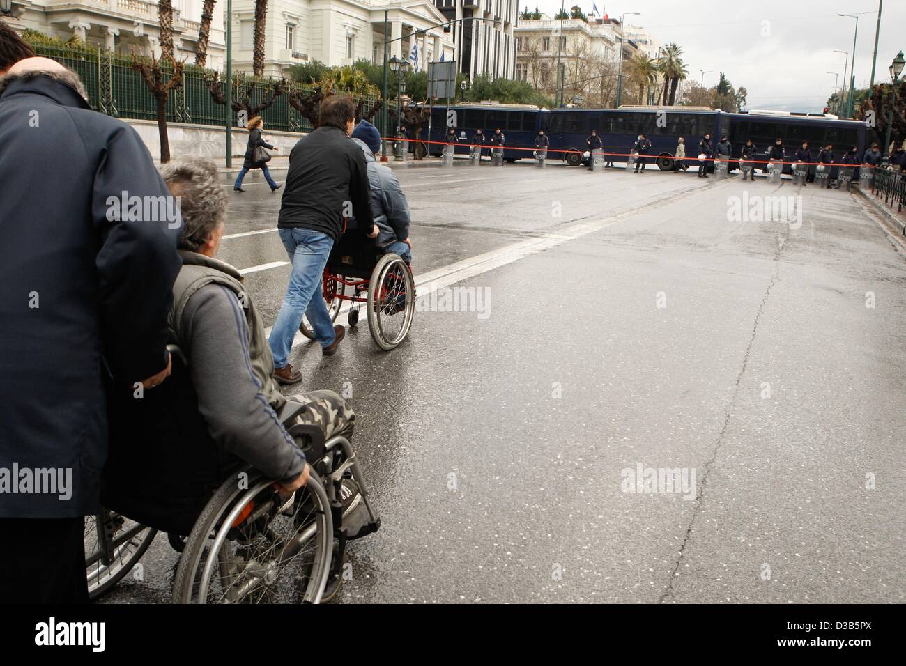 Athens, Greece. 15th February 2013. People with disabilities protest outside of the Greek parliament. (Credit Image: Credit:  Aristidis Vafeiadakis/ZUMAPRESS.com/Alamy Live News) Stock Photo