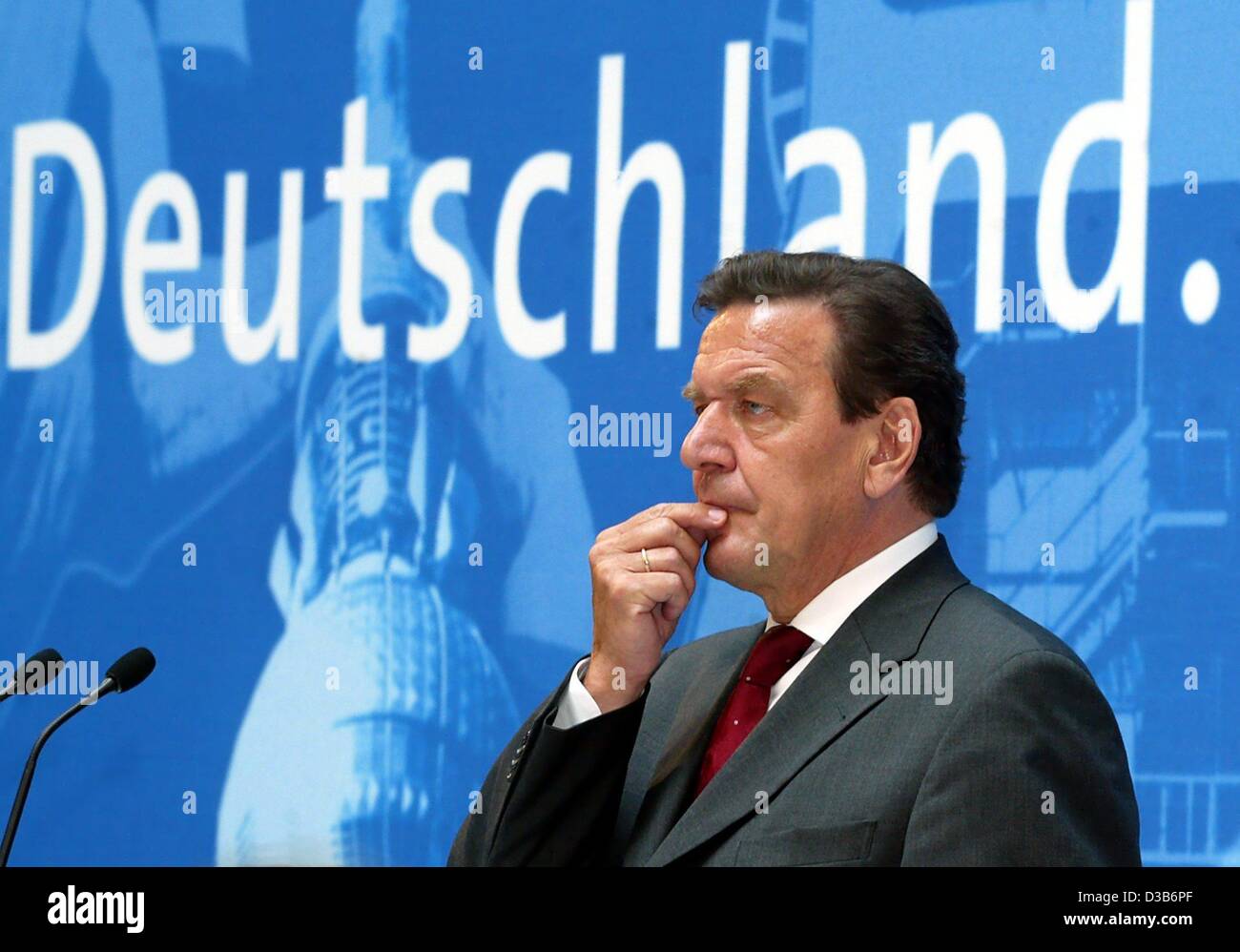 (dpa) - German Chancellor Gerhard Schroeder looks thoughtfully as he ...