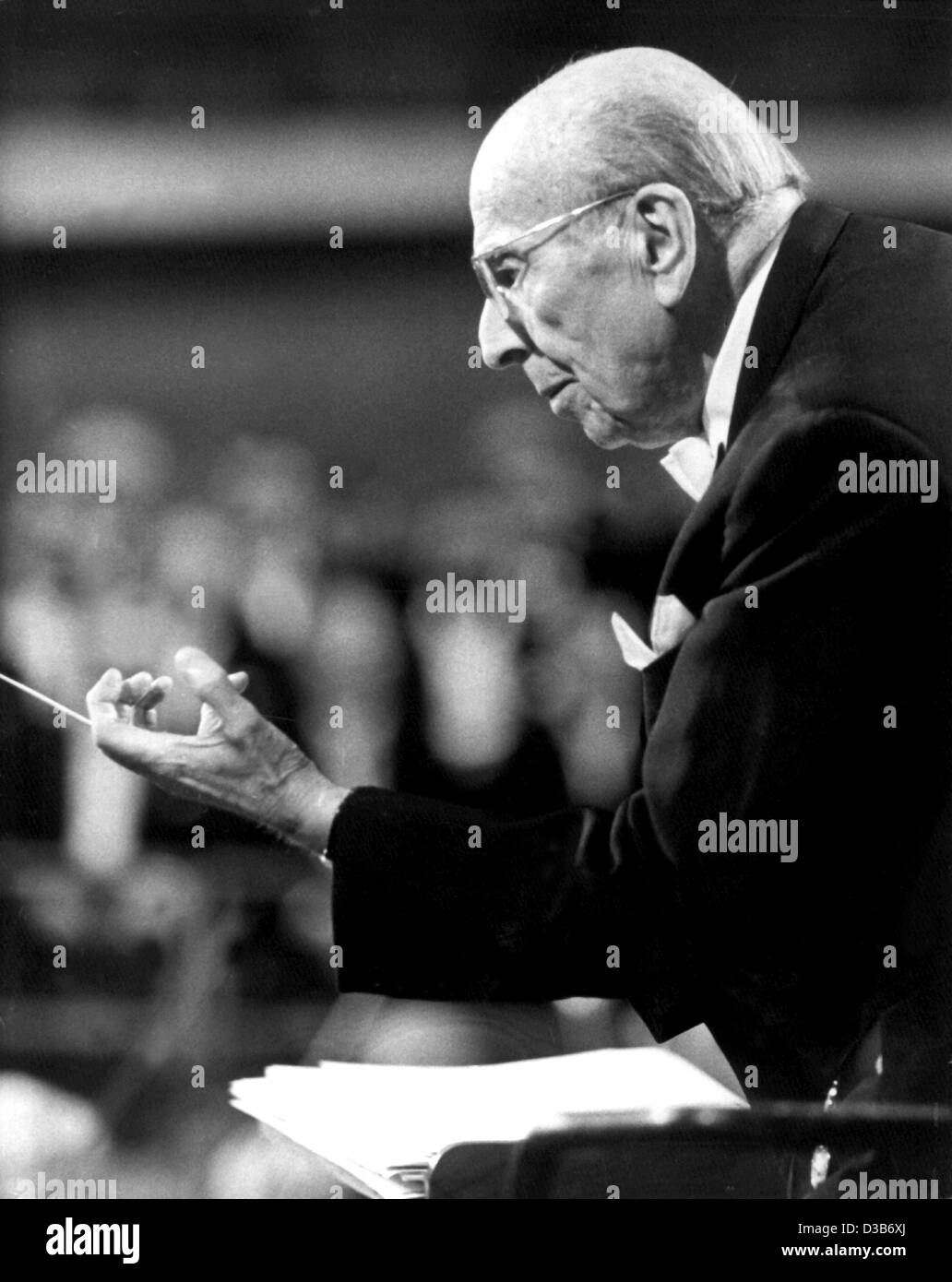 (dpa files) - Robert Stolz conducts a rehearsal of a gala event on the occasion of his 90th birthday in Berlin, in August 1970. Stolz composed many operettas, film scores and popular songs, including 'Two Hearts Beat in Three-Quarter Time' (1930). In Hollywood, he won two Oscars for his musical scor Stock Photo