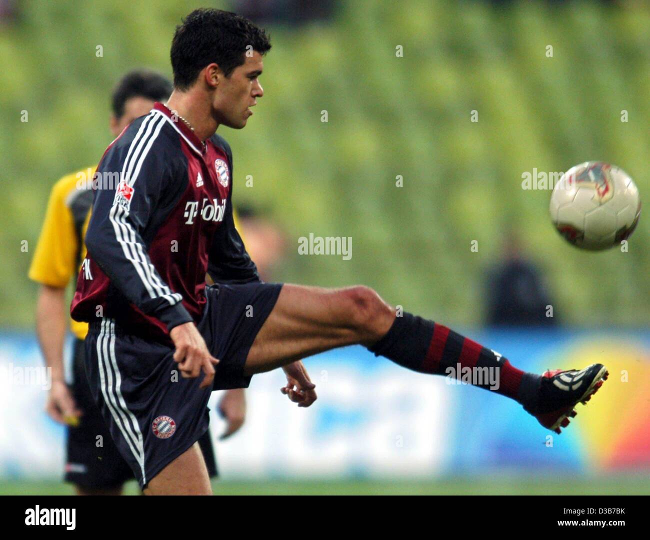 (dpa) - Bayern's midfielder Michael Ballack plays the ball in the match against Hertha BSC Berlin, Munich, 30 November 2002. Bayern wins 2-0, both goals were scored by Ballack. Stock Photo