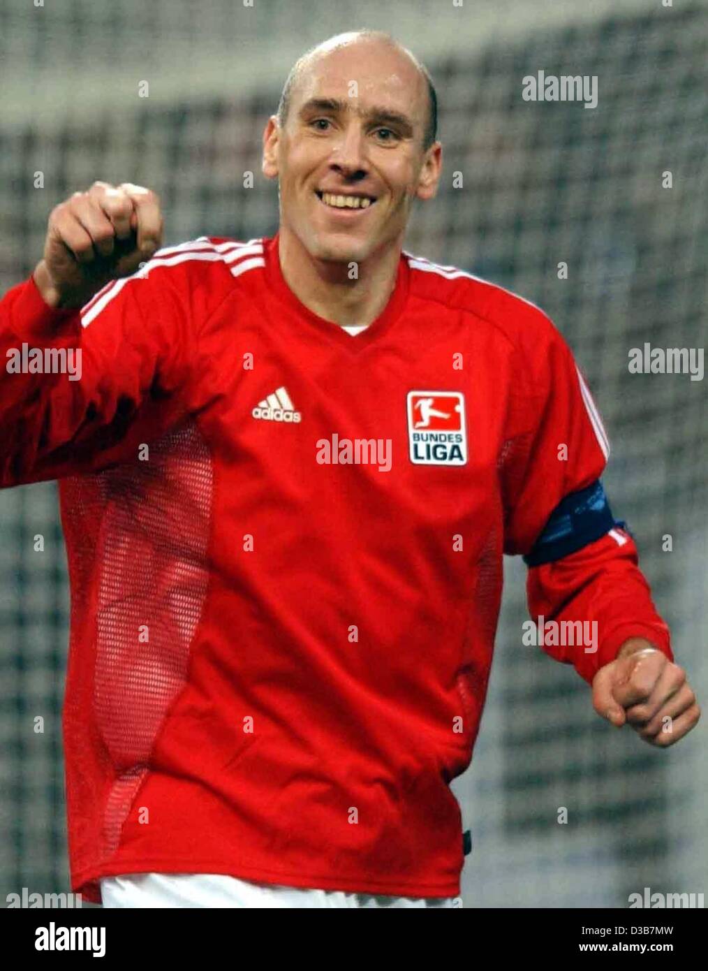 (dpa) - Jan Koller of the 'Bundesliga Allstars' team is celebrating his equalising 2-2 goal, Gelsenkirchen, Germany, 16 December 2002. The German players conquered a team of foreigners playing for German clubs 4-2. The proceeds of 3.5 million euros are for the benefit of football clubs that were dam Stock Photo
