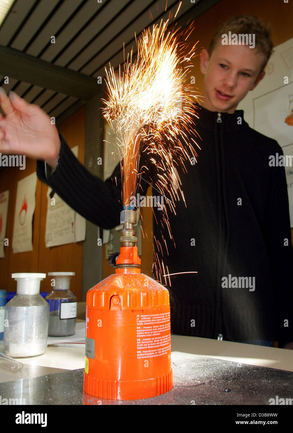 (dpa) - A student experiments with fire during chemistry class at the ...