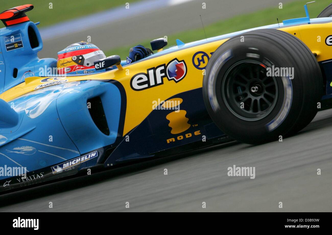 (dpa) - Spanish Formula One driver Fernando Alonso of Renault is pictured in action during the practice session at the Silverstone circuit, UK, Saturday, 09 July 2005. The British Grand Prix will take place at the Silverstone circuit on Sunday, 10 July. Alonso clocked the fastest time at the fourth  Stock Photo