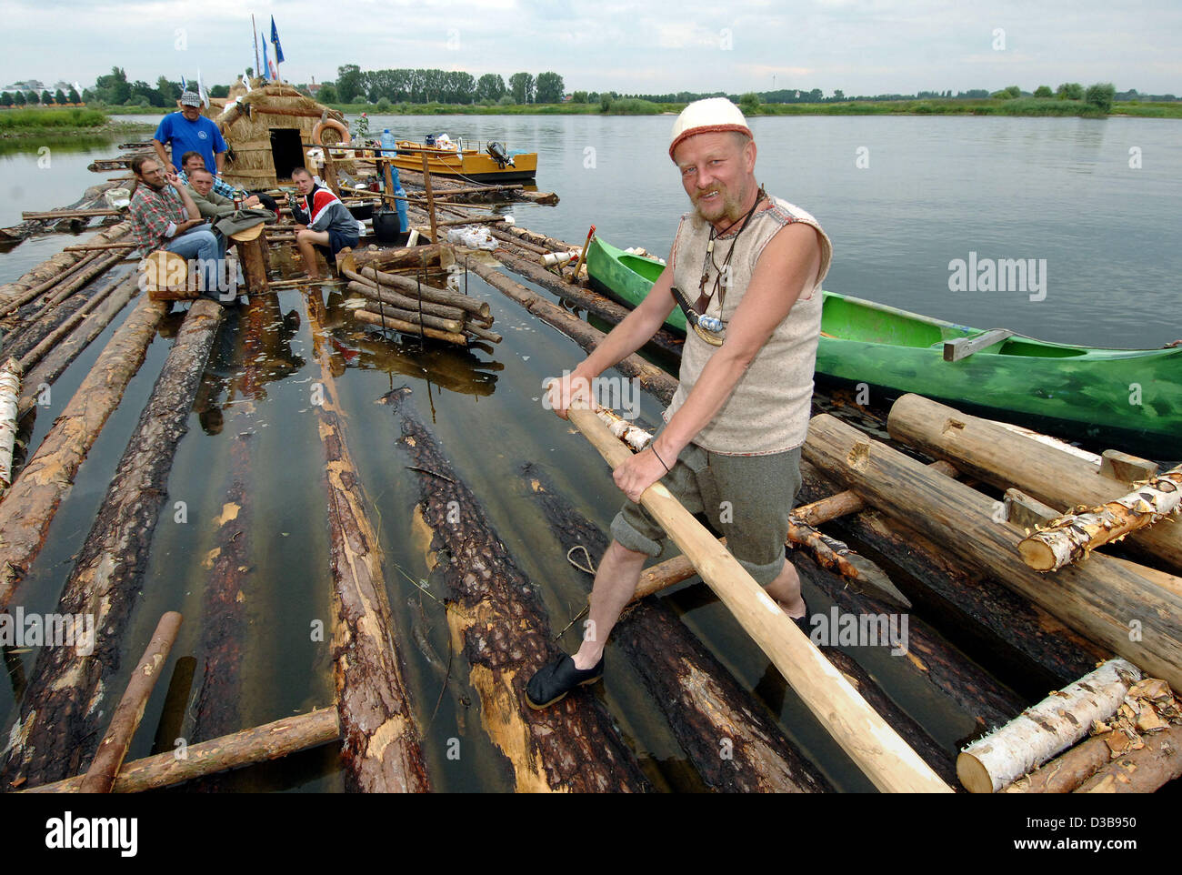 (dpa) - Vislav Milenko from the Polish Swinemuende steers a 60 m long ...