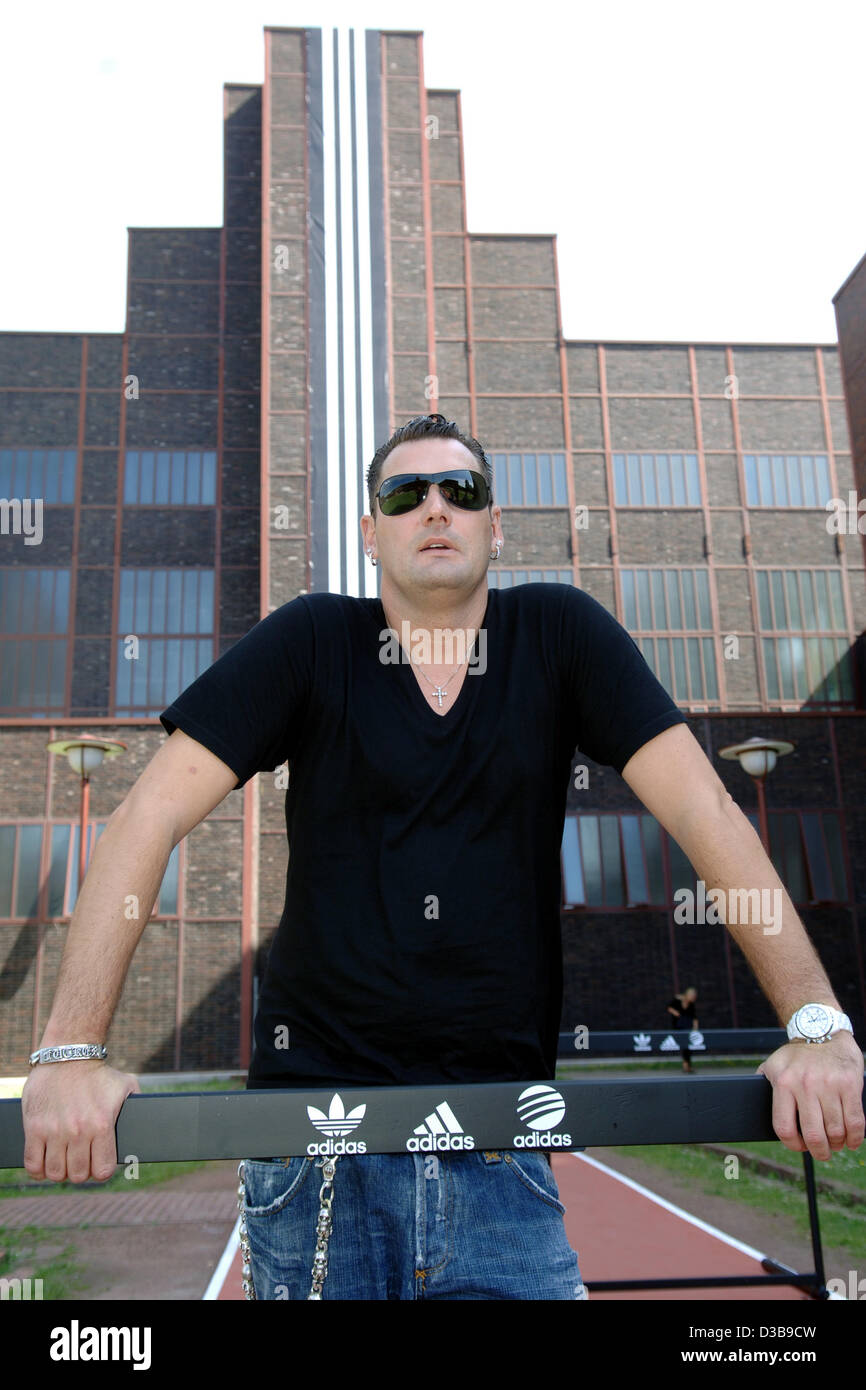 (dpa) - The picture shows Michael Michalsky, creative director of German manufacturer of sport goods and clothing adidas, in front of the Design Center NRW in Essen, Germany, 04 July 2005. Michalsky and his team won the award 'design team of the year'. Stock Photo