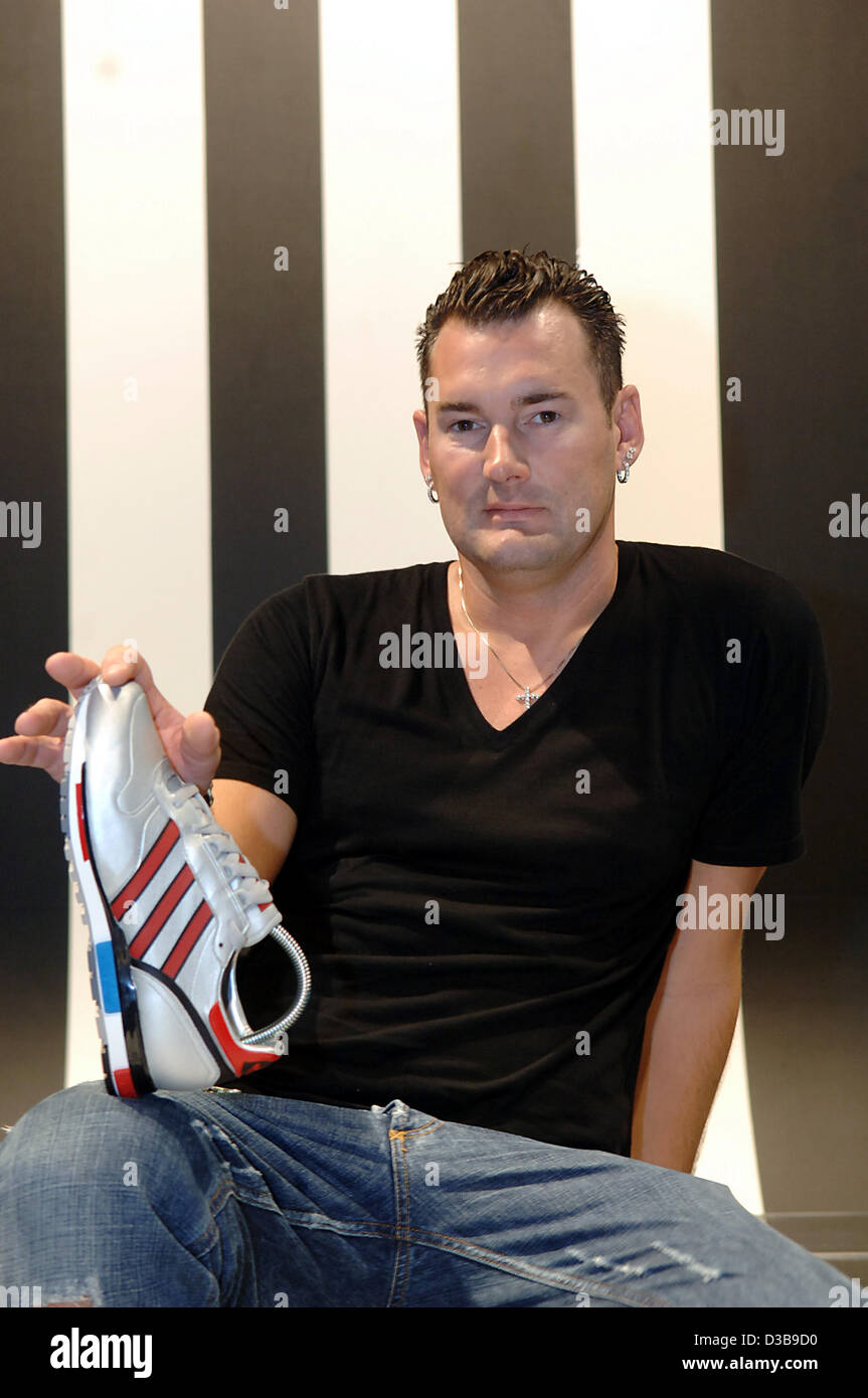 (dpa) - The picture shows Michael Michalsky, creative director of German manufacturer of sport goods and clothing adidas, during a special exhibition on the red dot design award in the Design Center NRW in Essen, Germany, 04 July 2005. Michalsky and his team won the award 'design team of the year'. Stock Photo