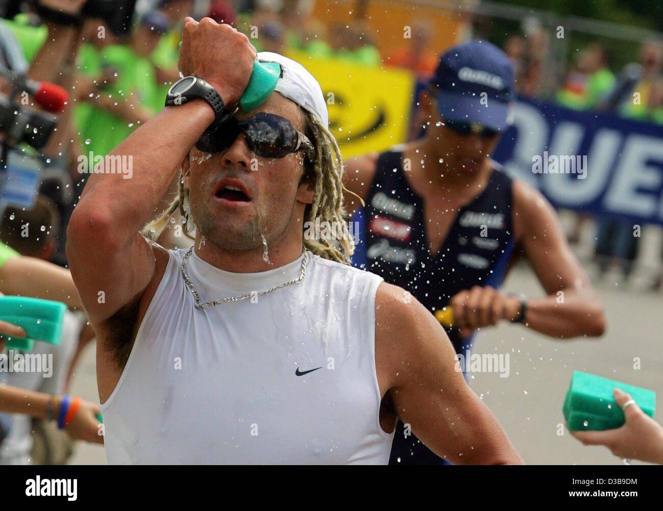 Sports spo triathlon athletes running cap facial_expression wetting germany  hi-res stock photography and images - Alamy