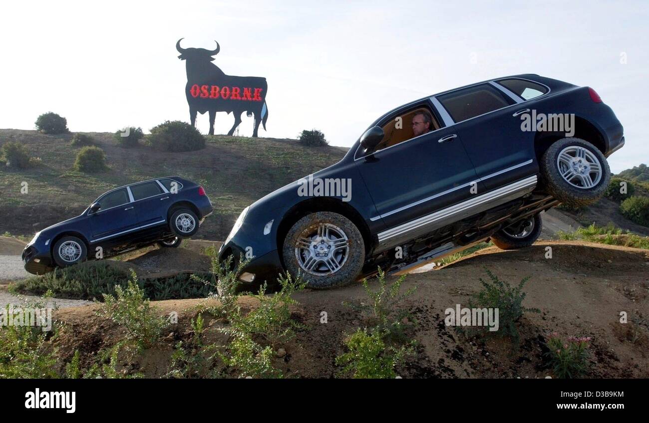 (dpa) - Testdrivers show the abilities of the new Porsche Cayenne cross country vehicle on an offroad track near Jerez de la Frontera, Spain, 5 November 2002. The new Porsche model will be available from 7 December 2002 in Germany. Stock Photo