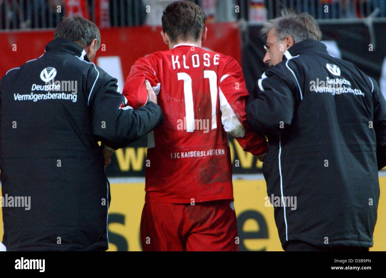 Sports spo soccer backs uniform assisting helping germany hi-res stock ...