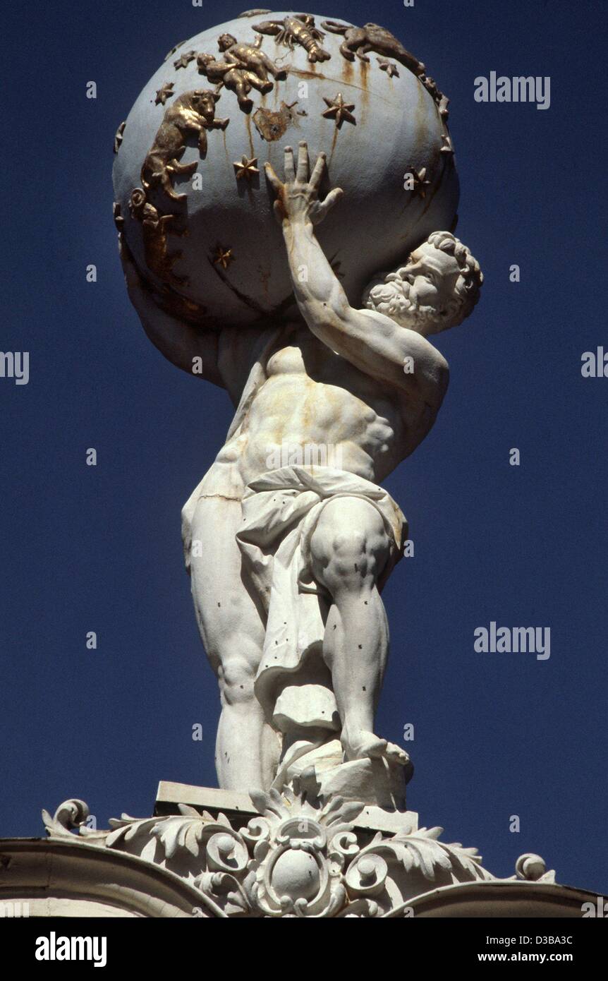 dpa) - The sculpture of titan Atlas carrying the globe tops the main facade  of Castle Linderhof in Bavaria (undated filer). The globe is decorated with  golden stars and the signs of