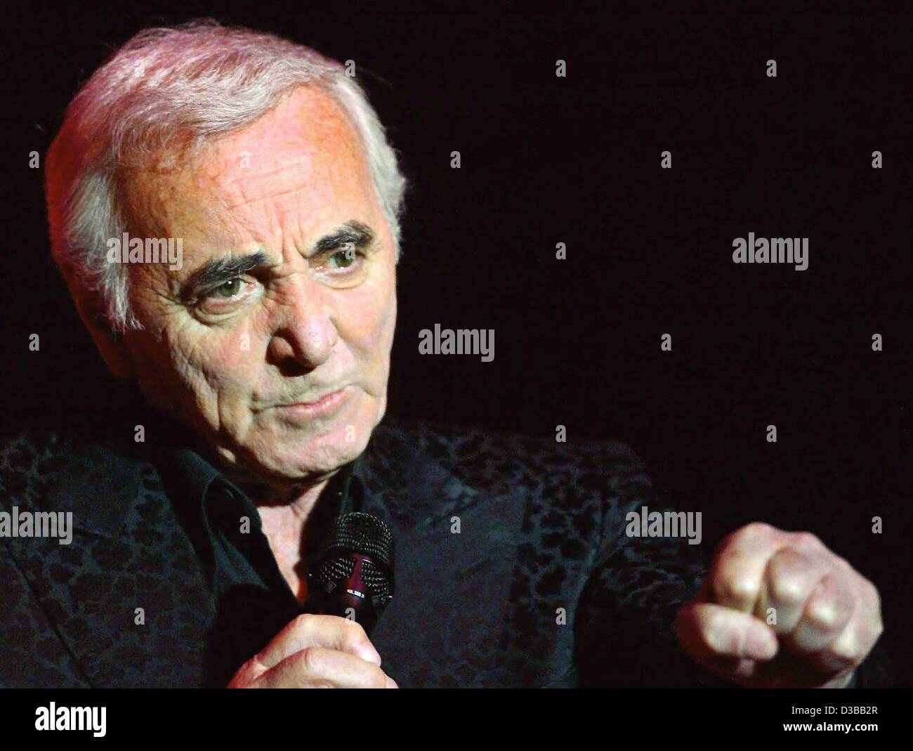 (dpa) - French chanson singer Charles Aznavour performs during his world tour in Hamburg, 5 October 2002. The 78-year-old tours the world as a farewell before retiring. However, he wants to continue singing every now and then. Aznavour had started his career about 64 years ago. Stock Photo