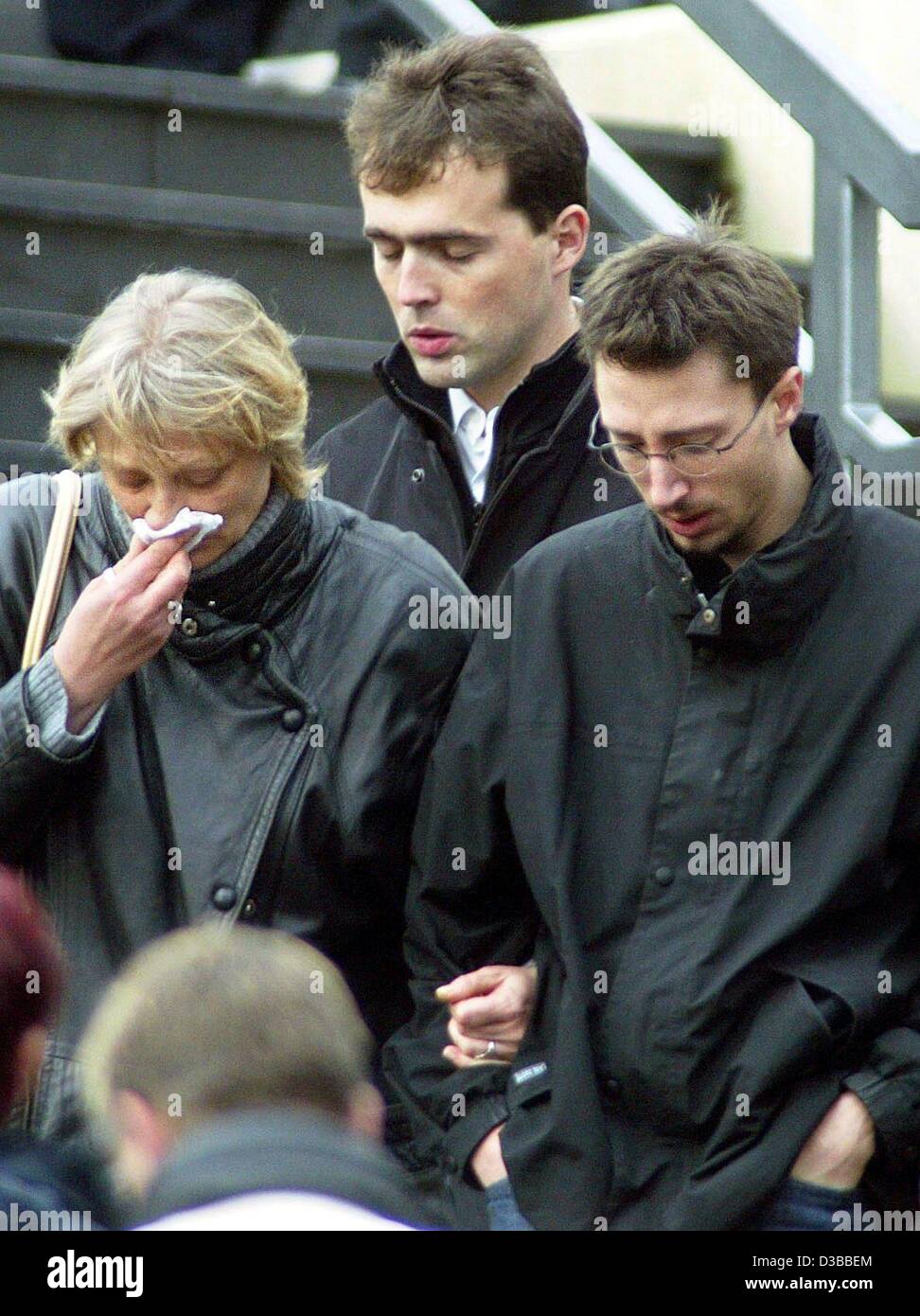 (dpa) - Relatives of the victims of the crashed Fokker 500 Luxair plane leave the memorial service held in a chapel in Roodt-Syre, Luxembourg, 7 November 2002. 17 people died when a Luxair plane from Berlin with 22 aboard crashed while approaching Luxembourg airport in dense fog 6 November 2002. Thr Stock Photo