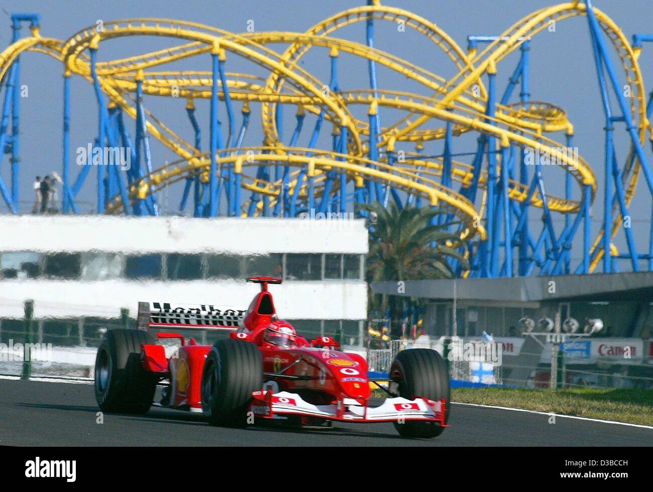 dpa German formula one champion Michael Schumacher races past a