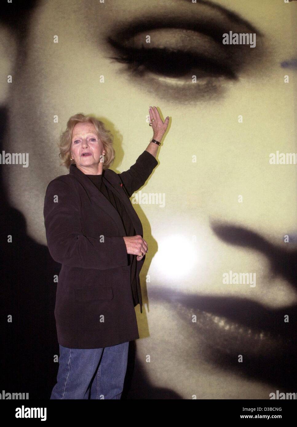 (dpa files) - Maria Riva, the daughter of Hollywood star Marlene Dietrich, stands in front of a poster of her mother at the opening of the Film Museum in Berlin, 25 September 2000. Stock Photo