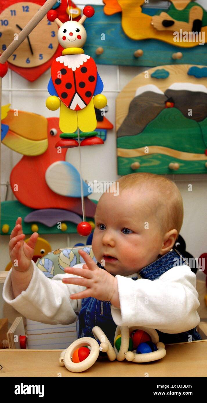 dpa) - The six-months-old Alina is an 'expert' for testing toys of her  grandfather's toy manufacturing company Hess Spielzeug, photographed at the  54th toy trade fair in Nuremberg, Germany, 29 January 2003