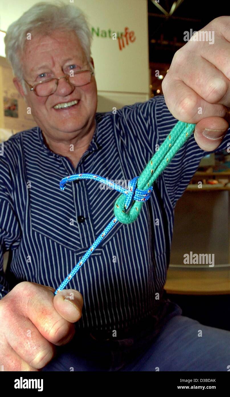 (dpa) - An older gentleman shows off a perfect double sheet bend knot at the yacht and boot show (boot 2003) in Duesseldorf, Germany, 20 January 2003.  Over 1,600 exhibitors from 52 countries will display 1,800 yachts and boats at the show through 26 January 2003. Stock Photo