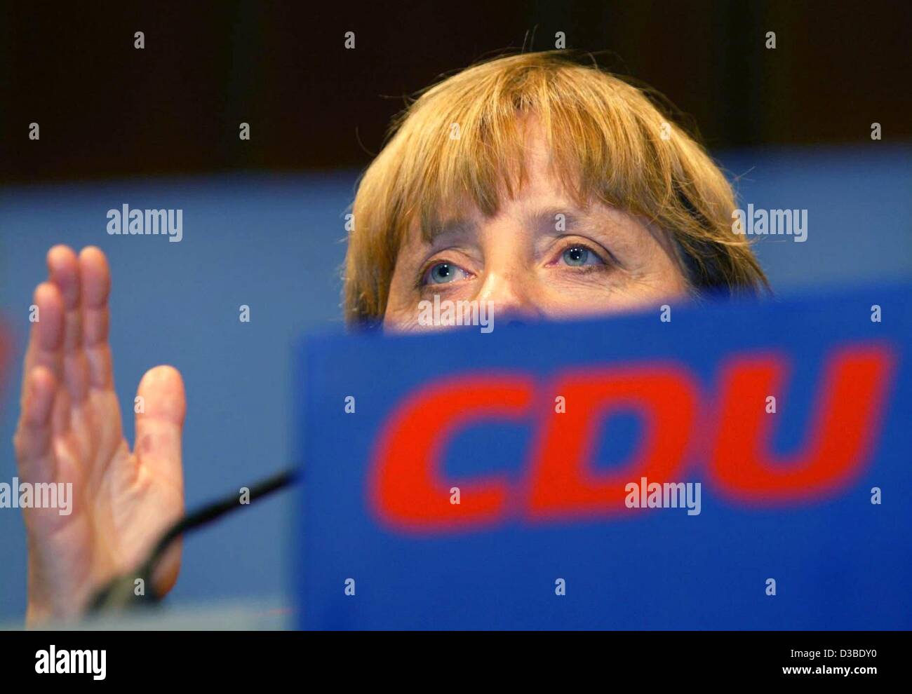 (dpa) - Angela Merkel, Chairwoman of the CDU party, gives a speech in the election campaign for the upcoming regional elections in the German state Lower Saxony, Osnabrueck, Germany, 23 January 2003. Merkel accuses Chancellor Schroeder of not taking the work of weapon inspectors of the United Nation Stock Photo