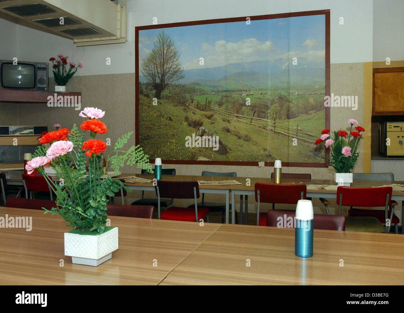 (dpa) - A pictured alpine motive decorates the wall in the dining room of the former GDR defence minister inside the nuclear bunker of the German People's Army in Harnekop near Berlin, 15 January 2003. The bunker of the East German People's Army (Nationale Volksarmee) was erected from 1971 to 1976.  Stock Photo