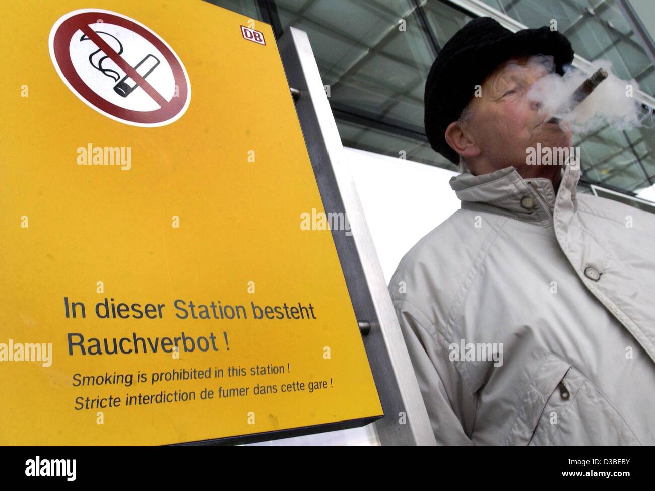 (dpa) - With signs such as these, Berlin's Ost-Bahnhof (east train station) announced its 'no smoking' policy to travelers in downtown Berlin, 10 January 2003.  Henceforth, smokers can light up only in small, restricted smoking areas without risking a fine.  Train station employees and station secur Stock Photo