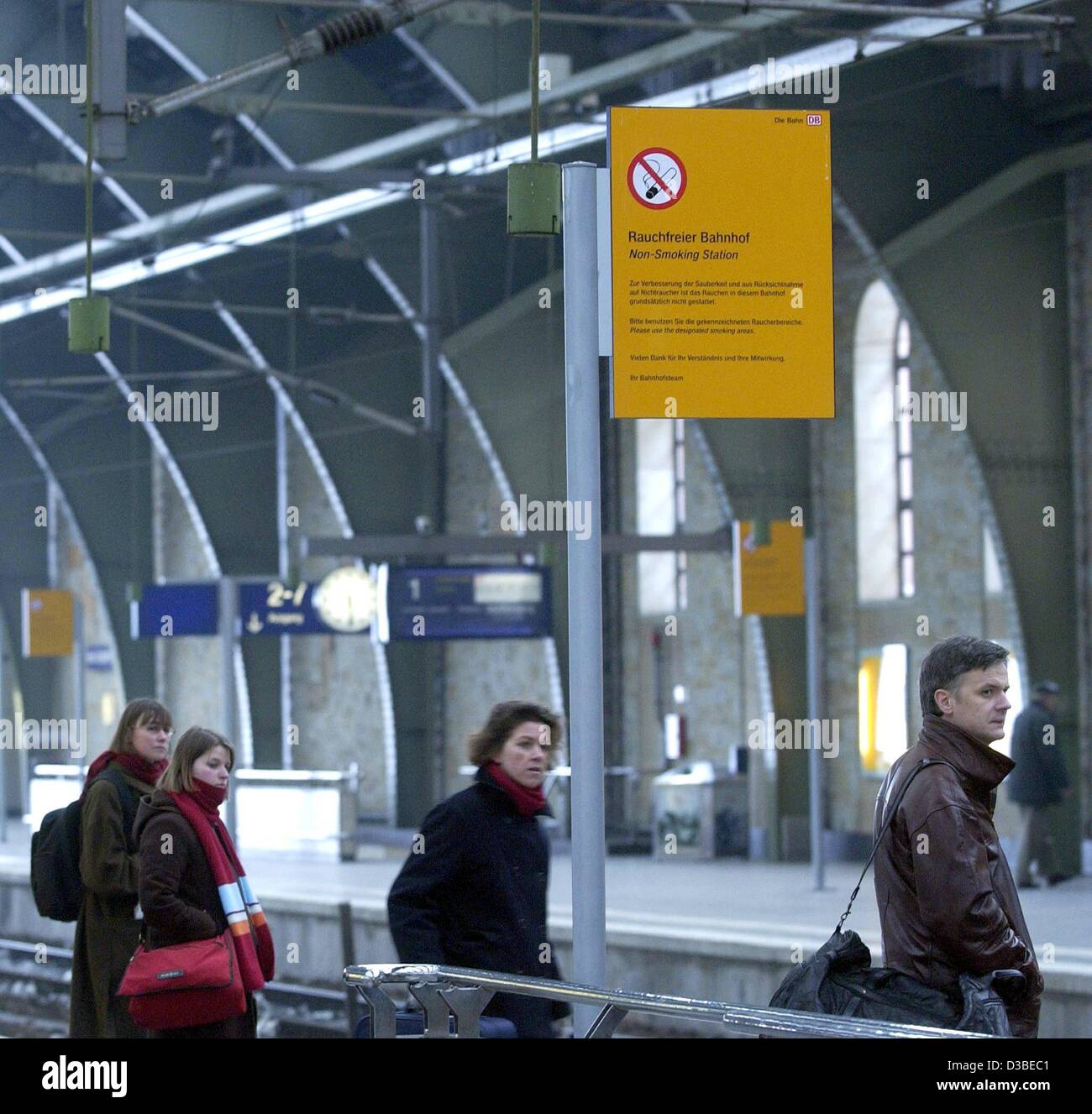 (dpa) - With signs such as these, Berlin's Ost-Bahnhof (east train station) announced its 'no smoking' policy to travelers in downtown Berlin, 10 January 2003.  Henceforth, smokers can light up only in small, restricted smoking areas without risking a fine.  Train station employees and station secur Stock Photo