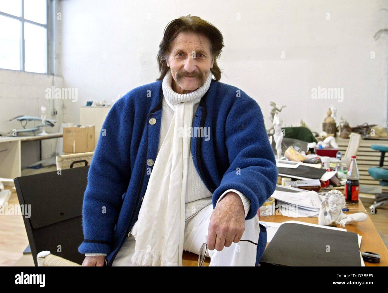 (dpa) - Industrial designer Luigi Colani is posing in his workshop in Karlsruhe, Germany, 13 January 2003. The Berlin born has been fighting against straight and angular forms for decades and all over the world. 'Where I am is the centre of design', Colani said. The 74-year-old recently returned fro Stock Photo