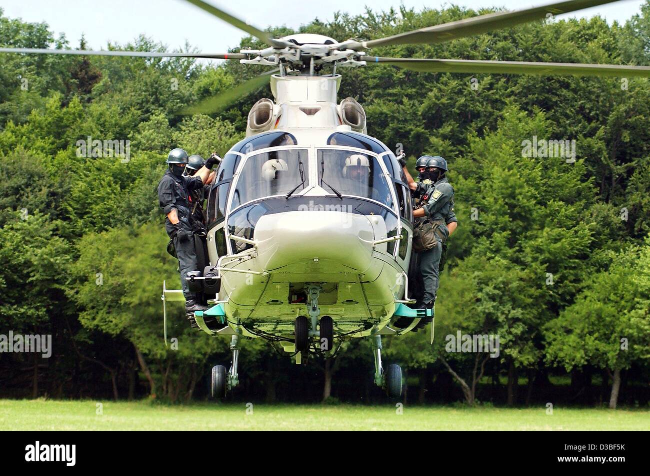 (dpa) - A Eurocopter of the type EC-155 manned with police special forces (SEK) takes off from a clearing during a police exercise near Deggingen, 25 June 2003. Pilots and training units of the police and of the SEK (Sondereinsatzkommando) took part in these execises. Stock Photo