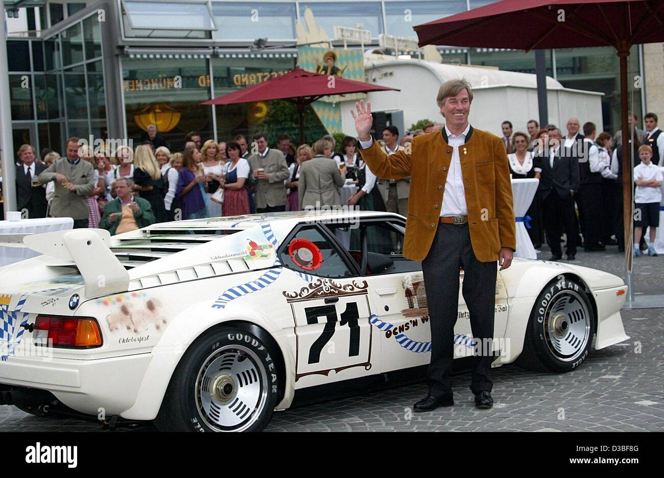 (dpa) - Prince Leopold of Bavaria, well-known as an enthusiastic automobil racer, poses in front of his race car at his birthday party in Rottach-Egern, Germany, 28 June 2003. Prince Leopold, or Poldi as his friends call him, invited royals and important people from film and economy to celebrate his Stock Photo