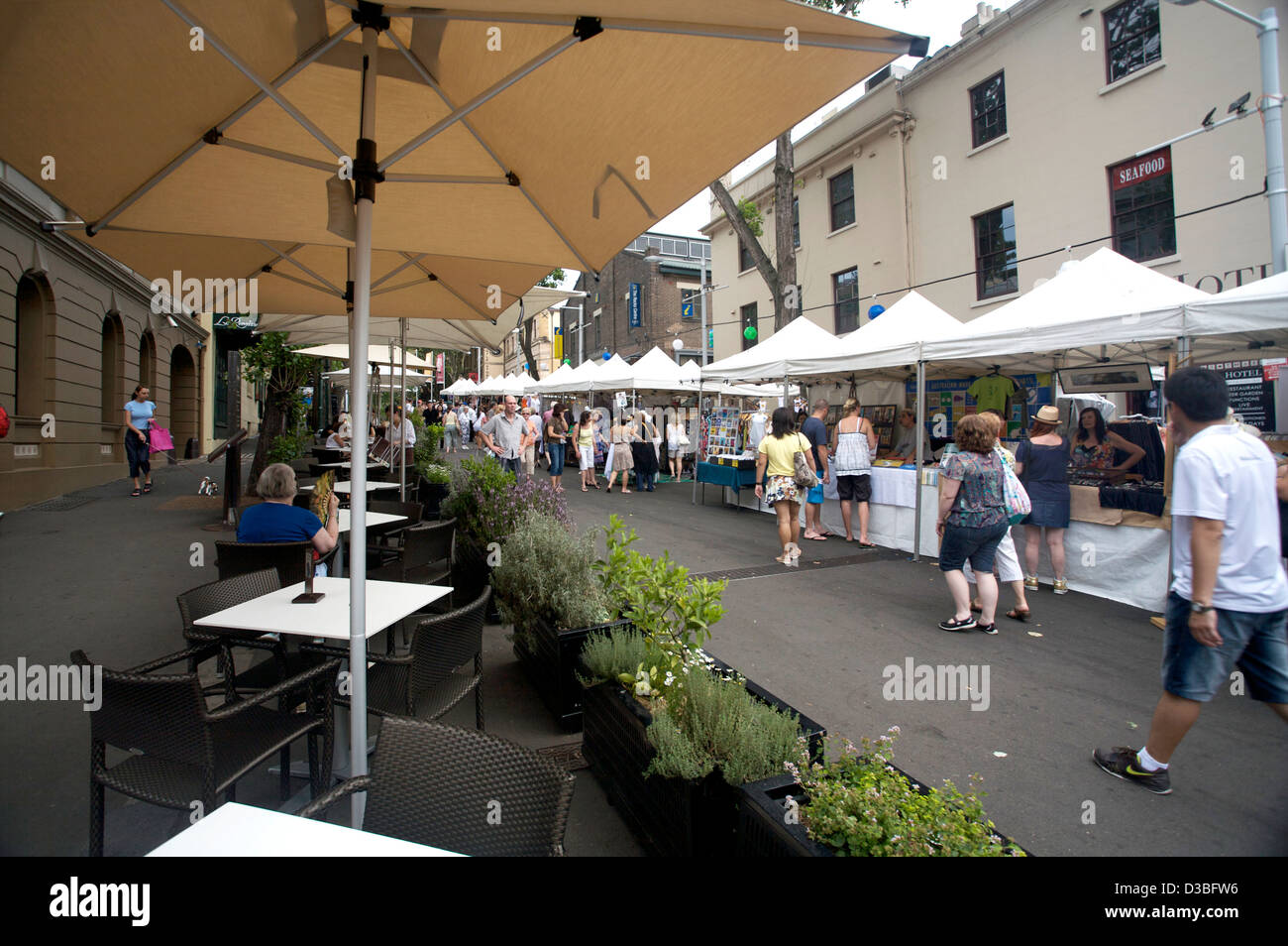 Shoppers in the Rocks shopping district of Sydney Australia NSW Stock Photo
