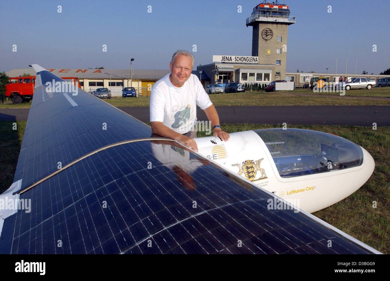 (dpa) - Rudolf Voit-Nitschmann is posing with his special aircraft 'Icare' in Jena, Germany, 17 June 2003. The university professor and plane builder has established a new, still unofficial record in solar powered manned flying. 53-year-old Voit-Nitschmann flew 350 kilometres within six hours with ' Stock Photo
