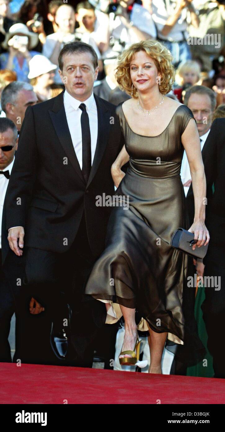 (dpa) - French director and this year's chairman of the jury Patrice Chereau walks with US actress Meg Ryan, who is also a member of this year's jury, walk up the steps towards the opening gala of the 56th International Filmfestival in Cannes, France, 14 May 2003. The first film which was officially Stock Photo