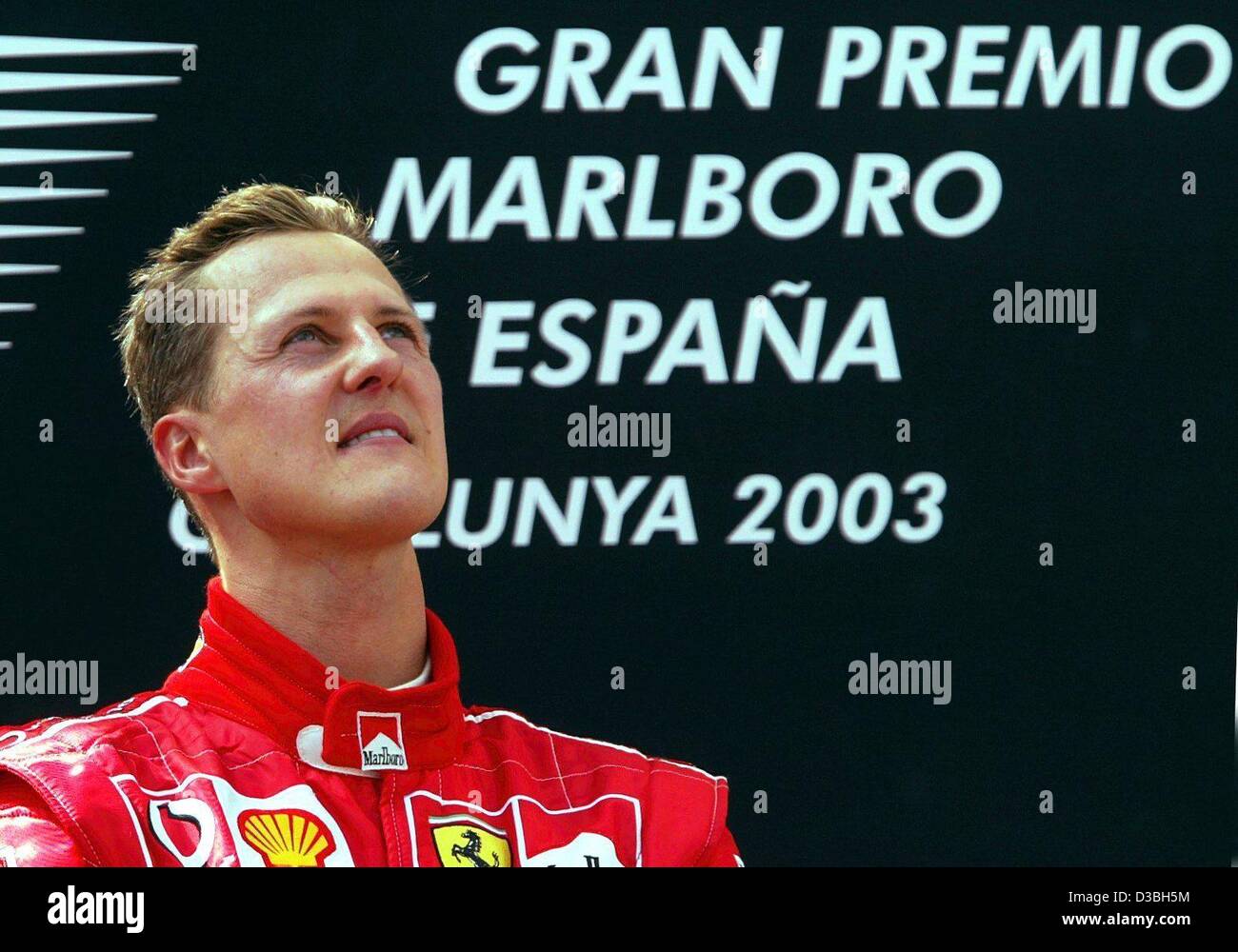 (dpa) - German formula one champion Michael Schumacher listens to the