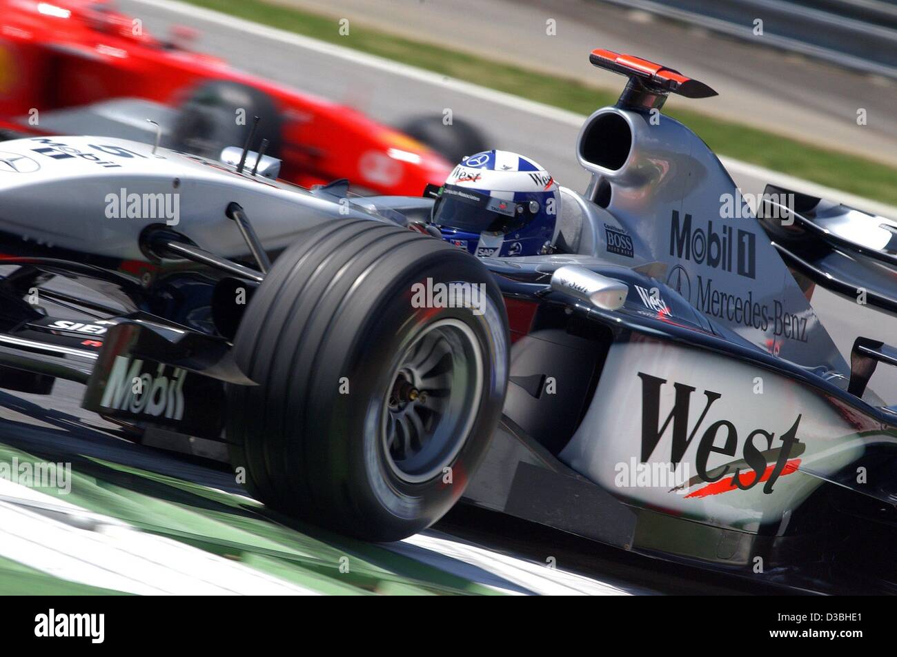 (dpa) - Scottish formula one pilot David Coulthard (McLaren-Mercedes) races along the racetrack with his formula one racing car in the qualifying training round during the Austrian grand prix on the A1-Ring racetrack in Zeltweg, Austria, 16 May 2003. The Austrian grand prix, which is the sixth rac Stock Photo