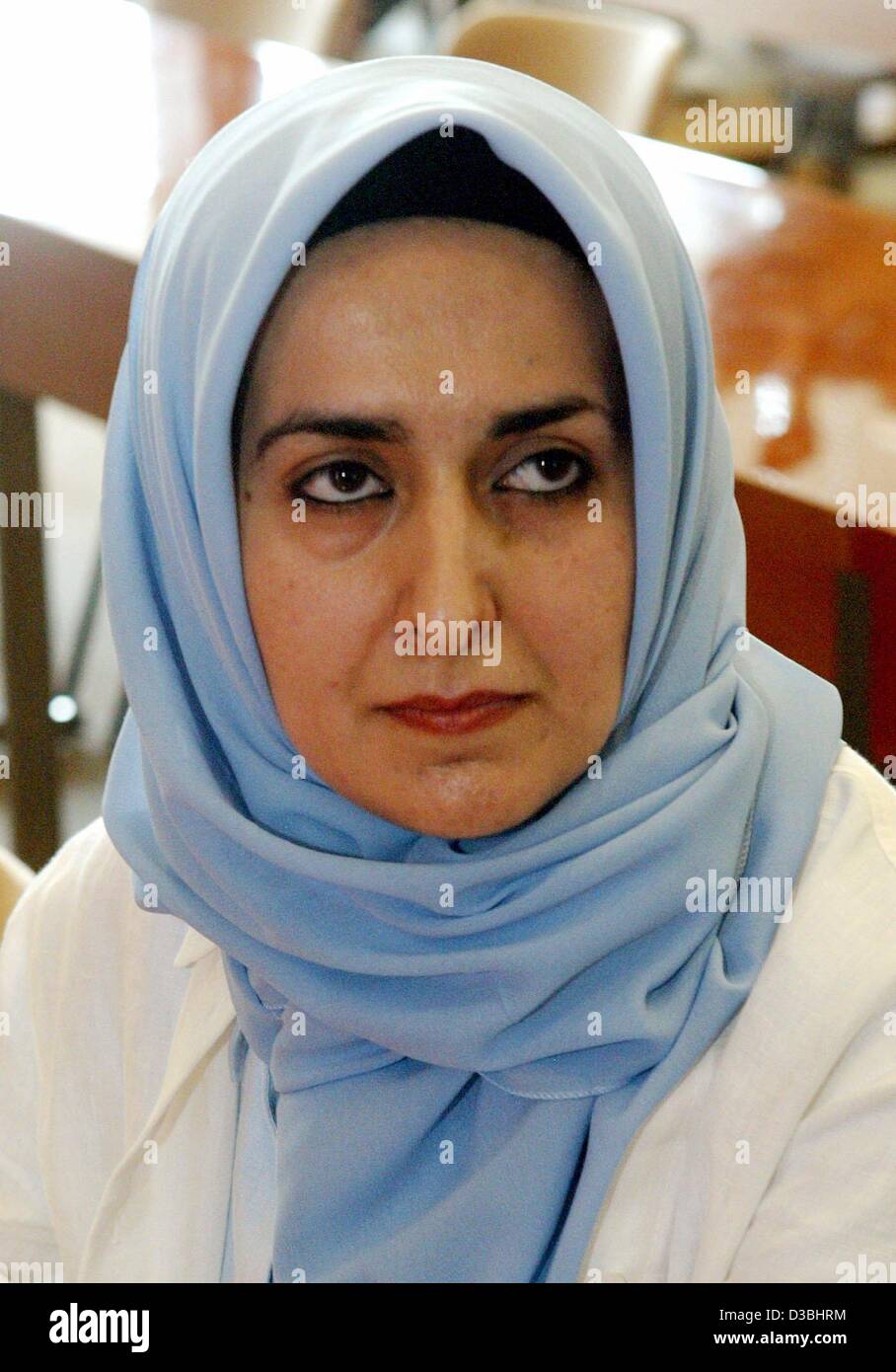 dpa) - Muslim teacher Fereshta Ludin wears her head scarf and sits in the  courtroom of the Constitutional Court in Karlsruhe, Germany, 3 June 2003.  The judges of the second senat of