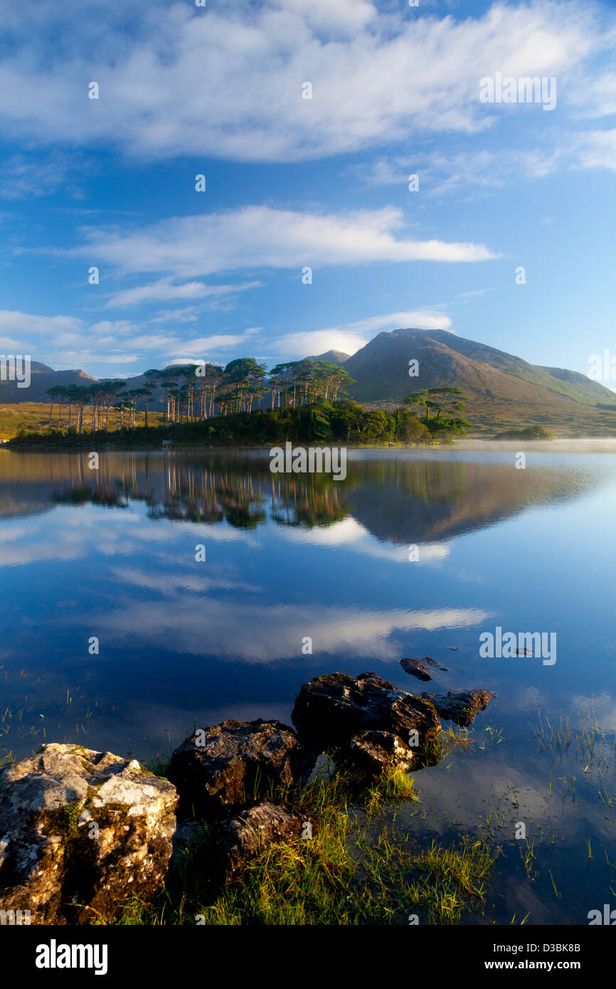 Morning reflection of the Twelve Bens in Derryclare Lough, Connemara, County Galway, Ireland. Stock Photo
