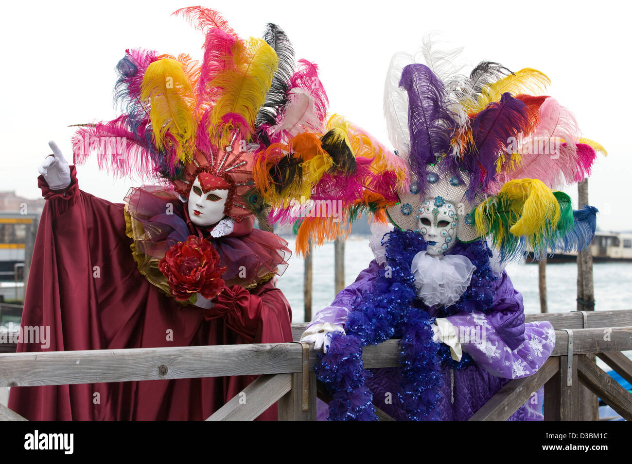 Couple dressed in Traditional venetian Costume wearing a Bauta Mask for ...