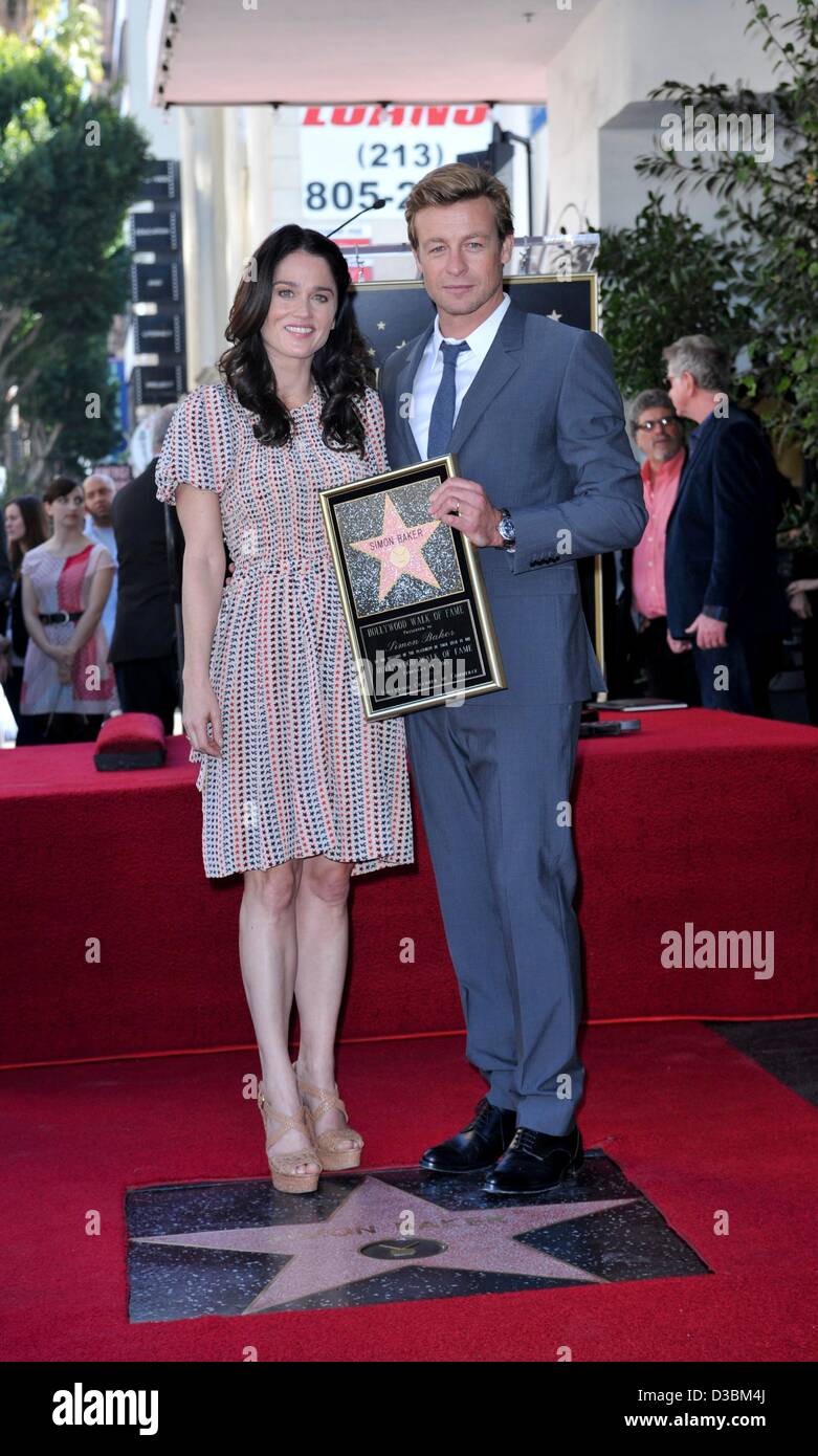 Robin Tunney, Simon Baker at the induction ceremony for Star on the Hollywood Walk of Fame for Simon Baker, Hollywood Boulevard, Los Angeles, CA February 14, 2013. Photo By: Elizabeth Goodenough/Everett Collection Stock Photo