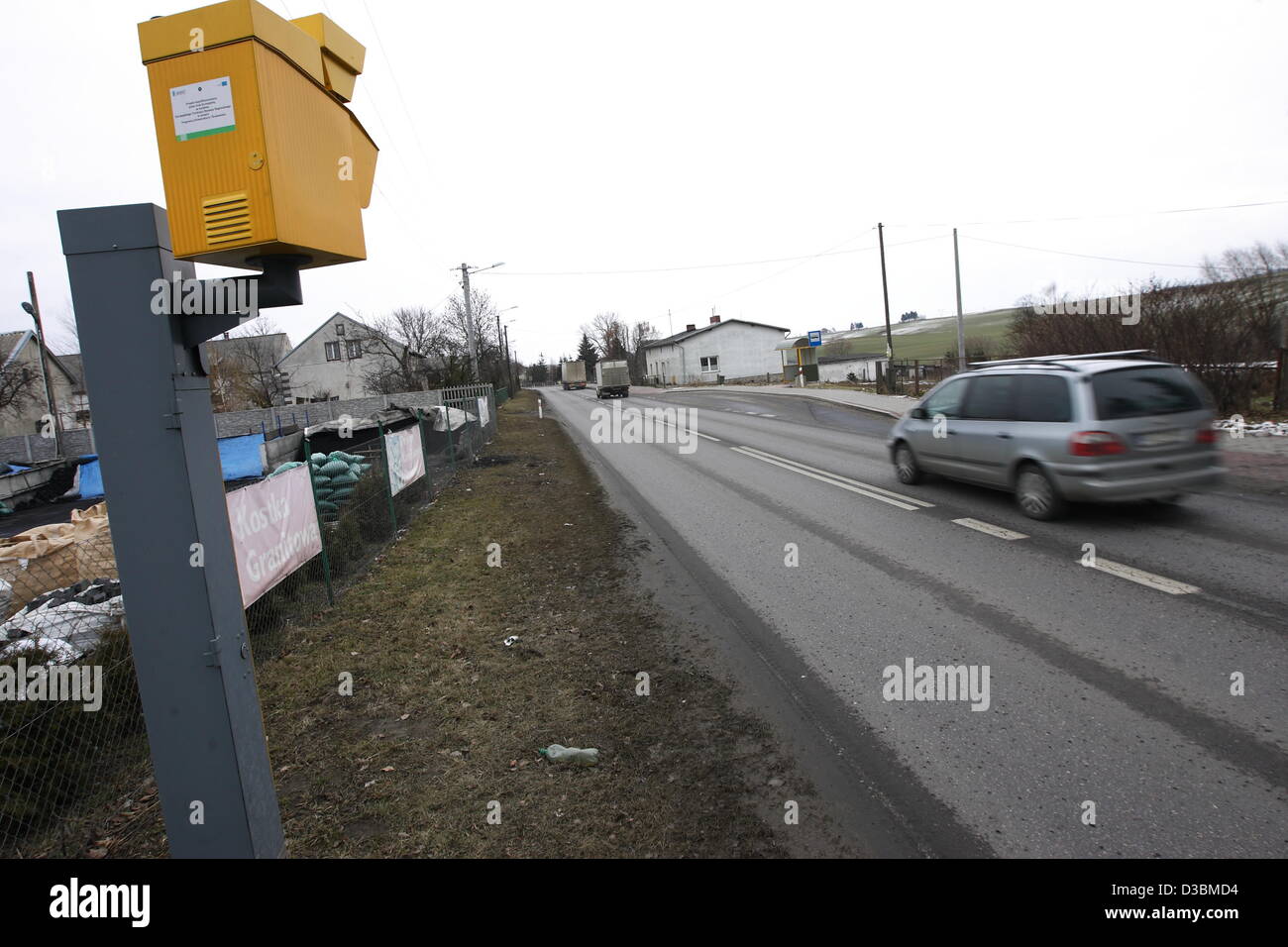 Baldram, Poland 15th, Fenruary 2013 Polish government has announced a new drive to cut the over 3,500 deaths a year on Polish roads , one of the worst road safety records in the EU , which includes placing more radar speed cameras at accident black spots. Pictured : new speed camera in village of Baldarm, Central Poland Stock Photo