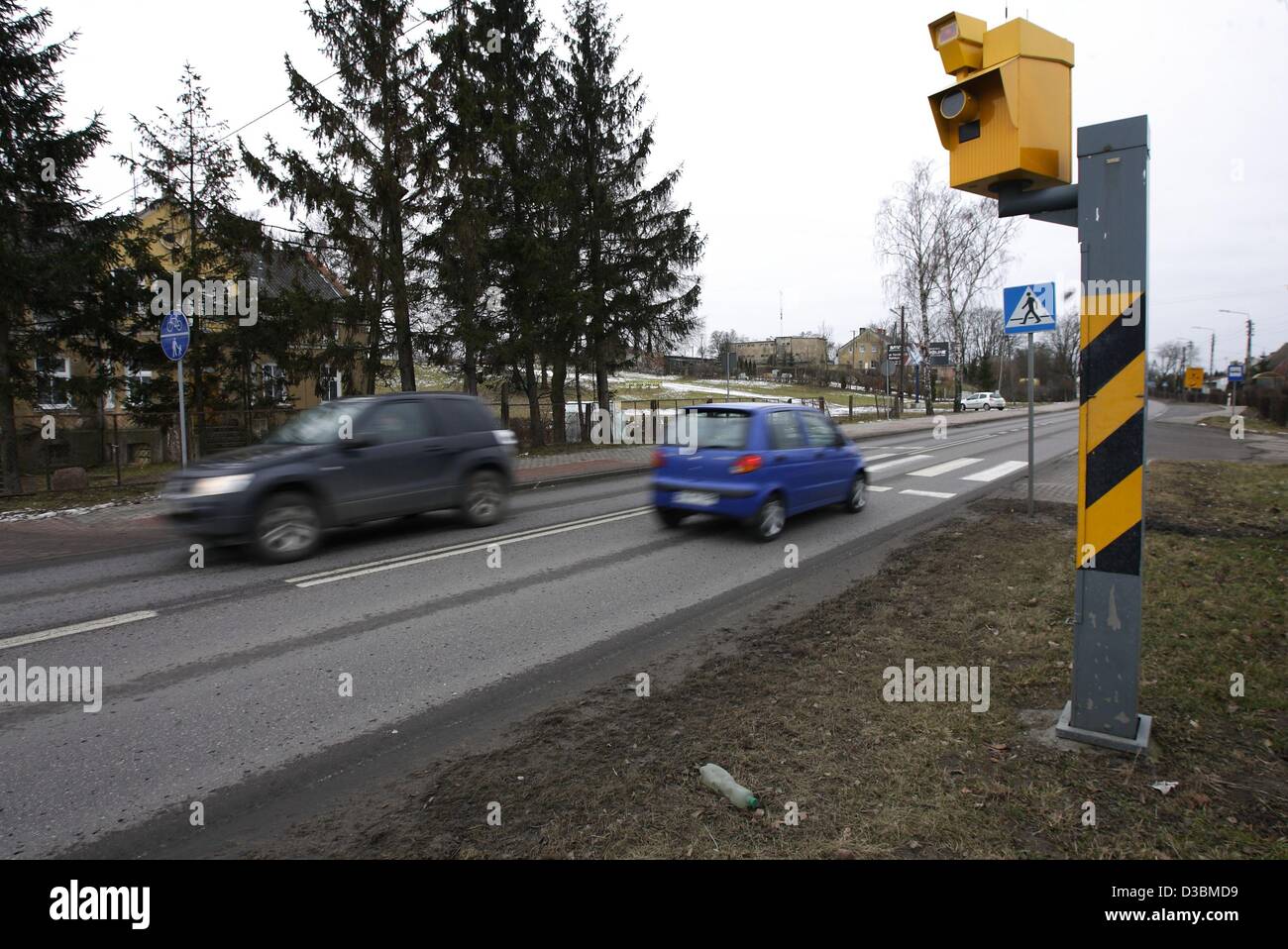 Baldram, Poland 15th, Fenruary 2013 Polish government has announced a new drive to cut the over 3,500 deaths a year on Polish roads , one of the worst road safety records in the EU , which includes placing more radar speed cameras at accident black spots. Pictured : new speed camera in village of Baldarm, Central Poland Stock Photo