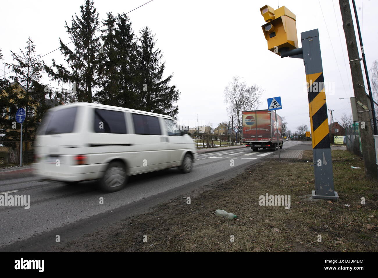 Baldram, Poland 15th, Fenruary 2013 Polish government has announced a new drive to cut the over 3,500 deaths a year on Polish roads , one of the worst road safety records in the EU , which includes placing more radar speed cameras at accident black spots. Pictured : new speed camera in village of Baldarm, Central Poland Stock Photo