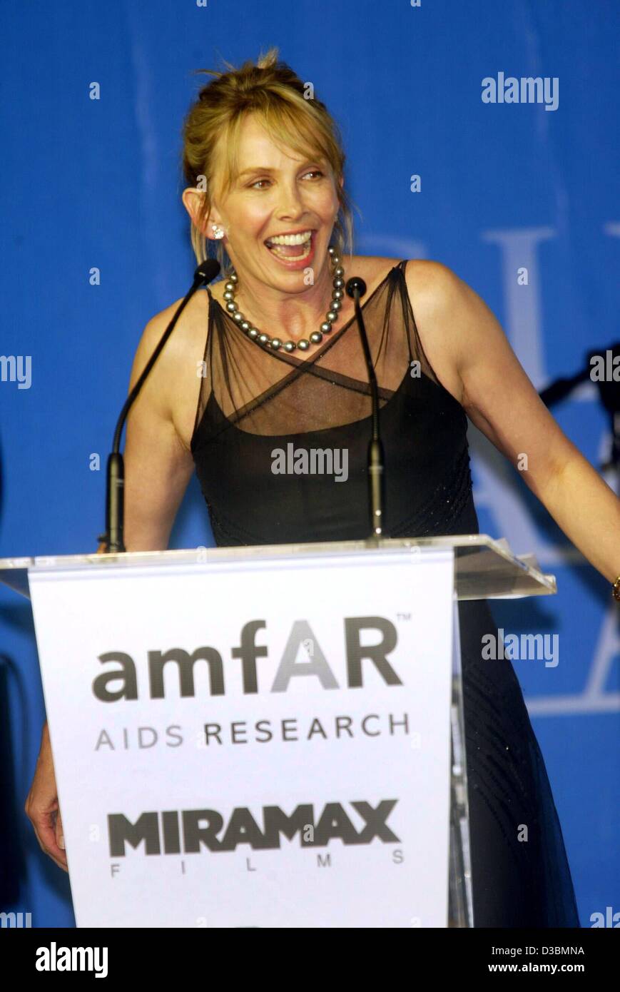 (dpa) - Trudie Styler, wife of popstar Sting, speaks during the auction at the AMFAR (American Foundation for Aids Research) charity gala at the Restaurant Moulin de Mougins near Cannes, France, 22 May 2003. Stock Photo
