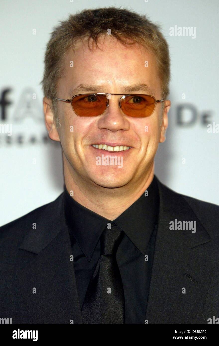 (dpa) - US actor Tim Robbins poses at the AMFAR (American Foundation for Aids Research) charity gala at the Restaurant Moulin de Mougins near Cannes, France, 22 May 2003. Stock Photo