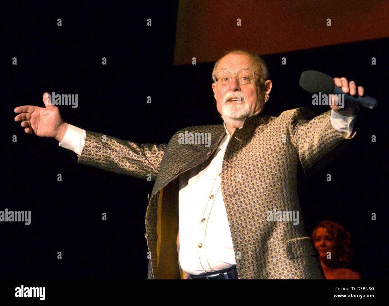 (dpa) - The British singer and entertainer Roger Whittaker stands on a stage in Suhl, Germany, 23 April 2003. After a break of three years, the 67-year-old will now tour Germany and Austria and present his new album 'mehr denn je' (more than ever). Stock Photo