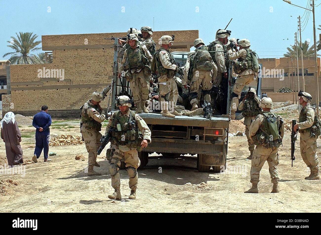 (dpa) - US soldiers patrol a suburb of Baghdad, Iraq, Asia, 24 April 2003. Presently, security is one of the most important themes in Iraq. Stock Photo