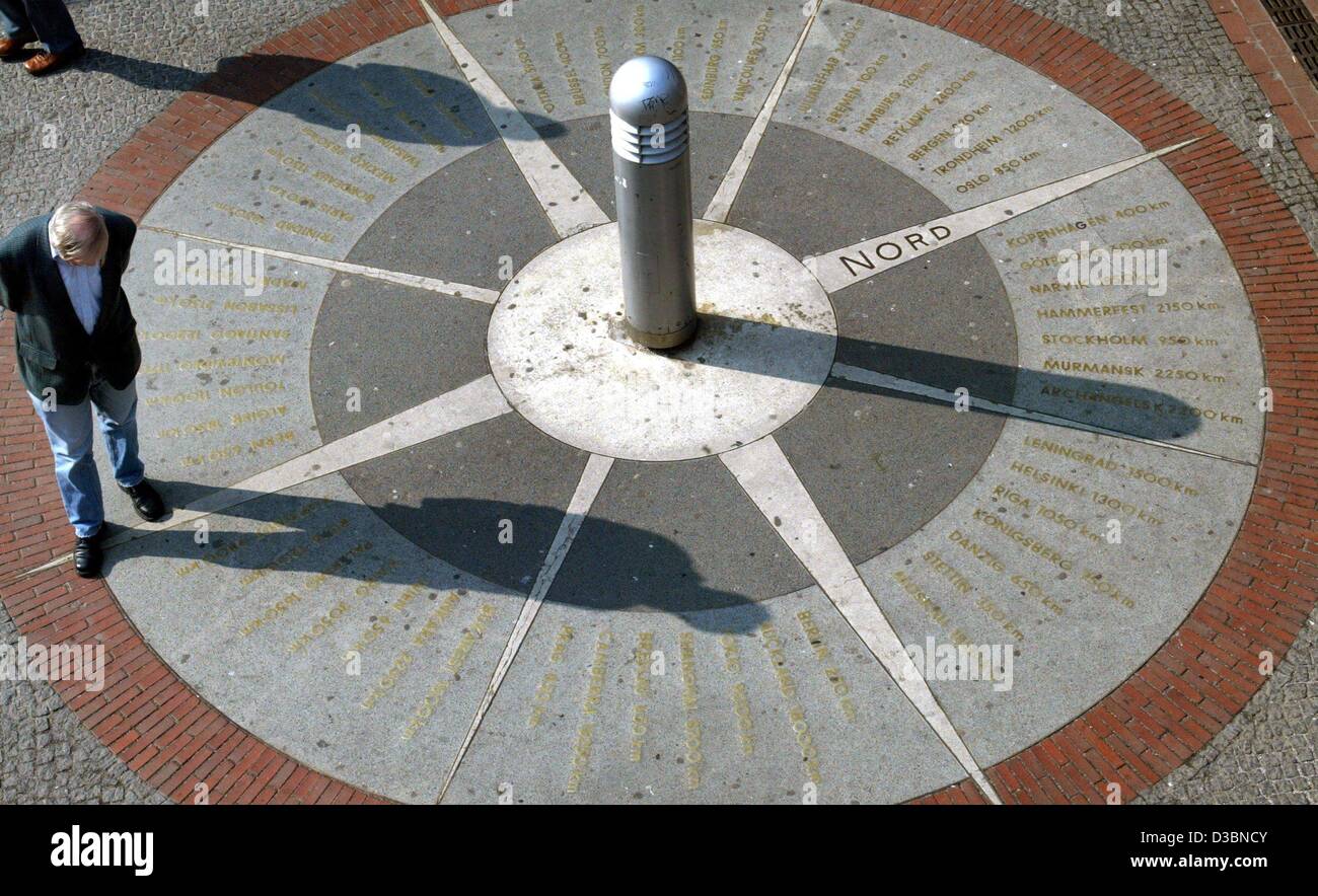 (dpa) - A passers-by casts his shadow across the sundial in Hanover in Hanover, Germany, 28 March 2003. Stock Photo
