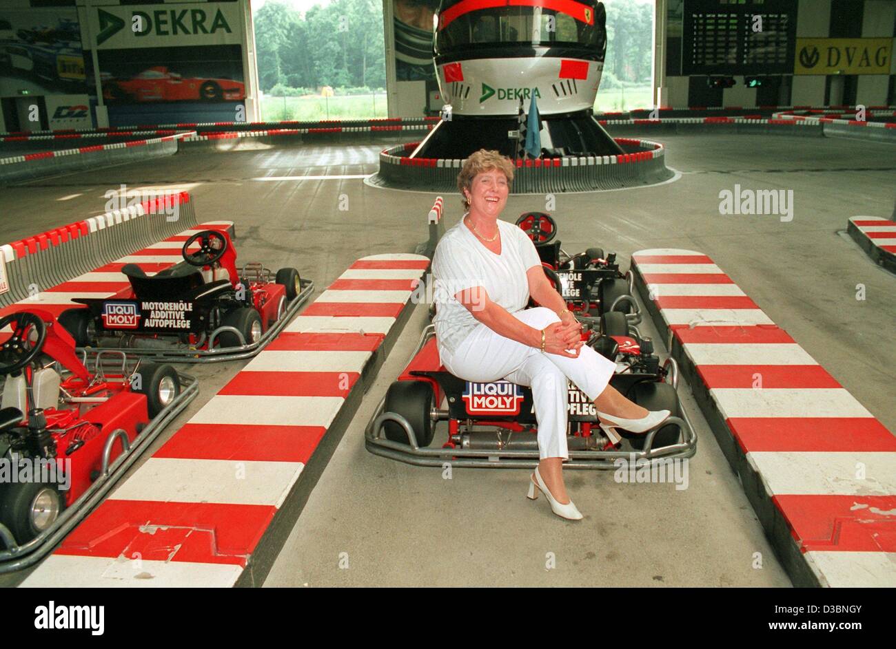 (dpa files) - Elisabeth Schumacher, mother of German Formula One drivers Michael and Ralf Schumacher, sits on a racing car at the family's cart circuit in Kerpen, Germany, July 1998. On Easter Sunday, 55-year-old Elisabeth Schumacher died of internal bleeding. Stock Photo