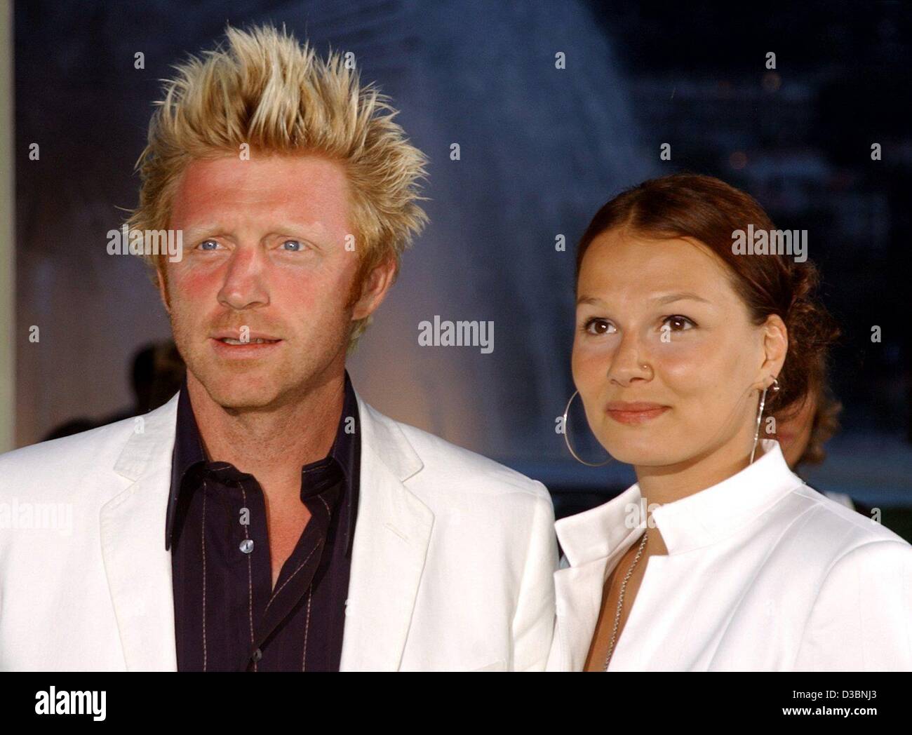 (dpa) - Boris Becker, former German tennis star, and German swimmer Franziska van Almsick arrive to the gala dinner for the Laureus Award at the sports club in Monte Carlo, 19 May 2003. Becker is one of the jurors, van Almsick one of the nominees for the award. The 'Laureus World Sports Award' will  Stock Photo